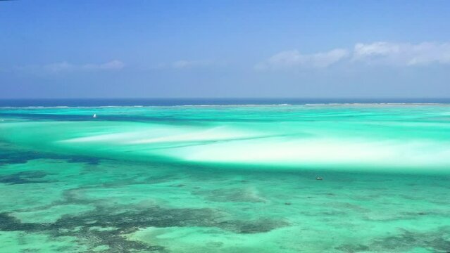 Wide aerial view by drone of the stunning Tanzanian beach.