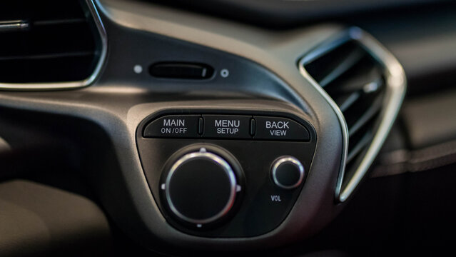 Ferrari 458 Italia infotainment system controls on dashboard - High Resolution Image
