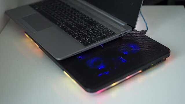 laptop fan stand blows air. High quality FullHD footage