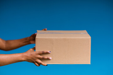 man holding a cardboard box