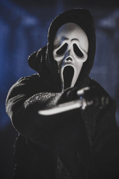 NEW YORK, USA: JAN 3 2024, Horror movie slasher Ghostface from the Scream franchise stalking with a knife - Neca action figure