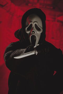 NEW YORK, USA: JAN 3 2024, Horror movie slasher Ghostface from the Scream franchise stalking with a knife - Neca action figure