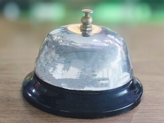 An iron bell that is usually used to order food at the table
