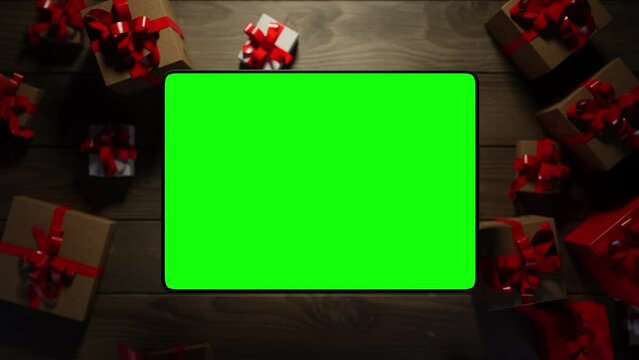 A graphics tablet rises above the table, displaying information. The animation has a green screen
