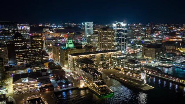 Aerial Hyperlapse Panoramic skyline of the night metropolis of Halifax, Canada