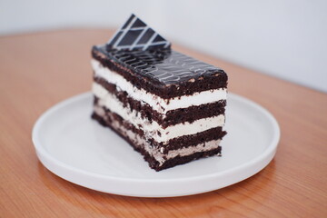 Delicious chocolate cake on a white plate