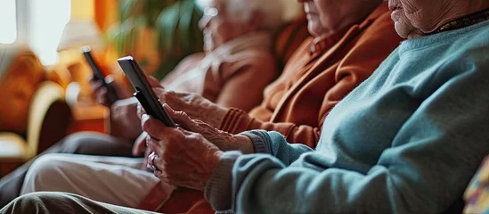 Foto op Plexiglas Multiracial senior friends with popcorns watching match over digital tablet in nursing home Wireless technology sport unaltered curiosity togetherness support assisted living and retirement © vxnaghiyev