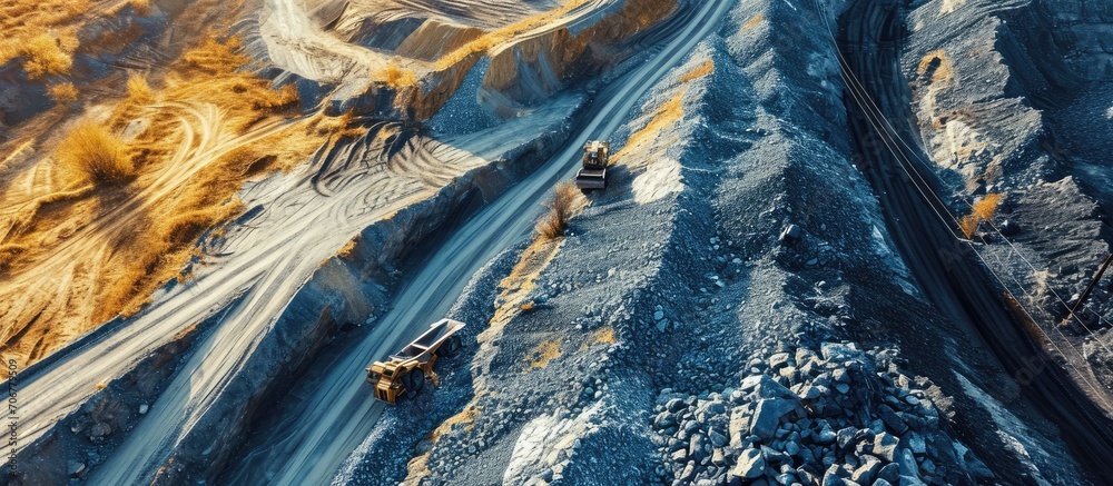 Poster Open pit mining quarry processes crushed type rock with gravel conveyance in work. with copy space image. Place for adding text or design