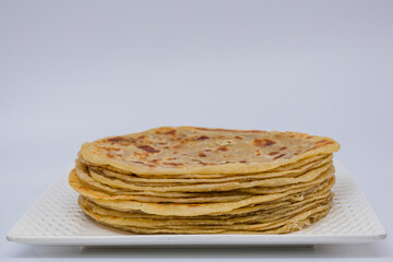 stack of pancakes with butter