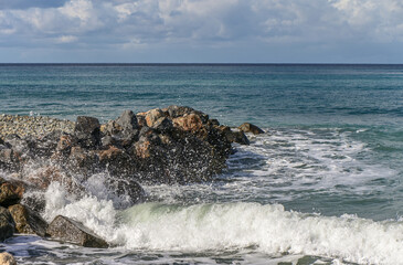 waves crashing on rocks near the shore on the Mediterranean Sea 9
