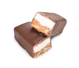 Pieces of tasty chocolate bars with nougat and nuts on white background