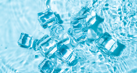 Blue water wave and ice cubes background.