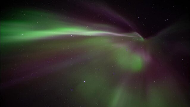 Breathtaking spectacle of Aurora Borealis viewed from beneath gazing upward