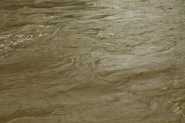 Muddy water from a high flow river