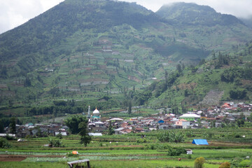 Banjarnegara, January 10, 2024 
landscape view of residents' houses under the mountain