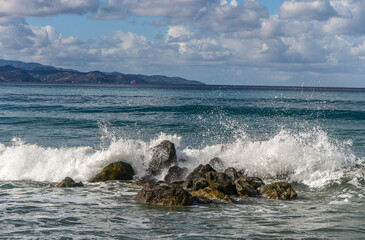 waves crashing on rocks near the shore on the Mediterranean Sea 12
