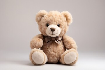 Obraz premium Adorable Light Brown Teddy Bear, Perfect Children’s Gift with Bow