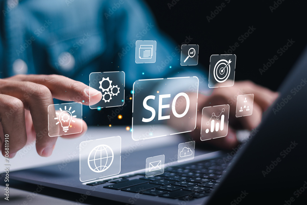 Wall mural businessman use laptop to analyze seo search engine optimization for promoting ranking traffic on we