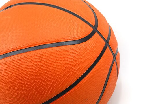 Basketball on a white background, partial view 