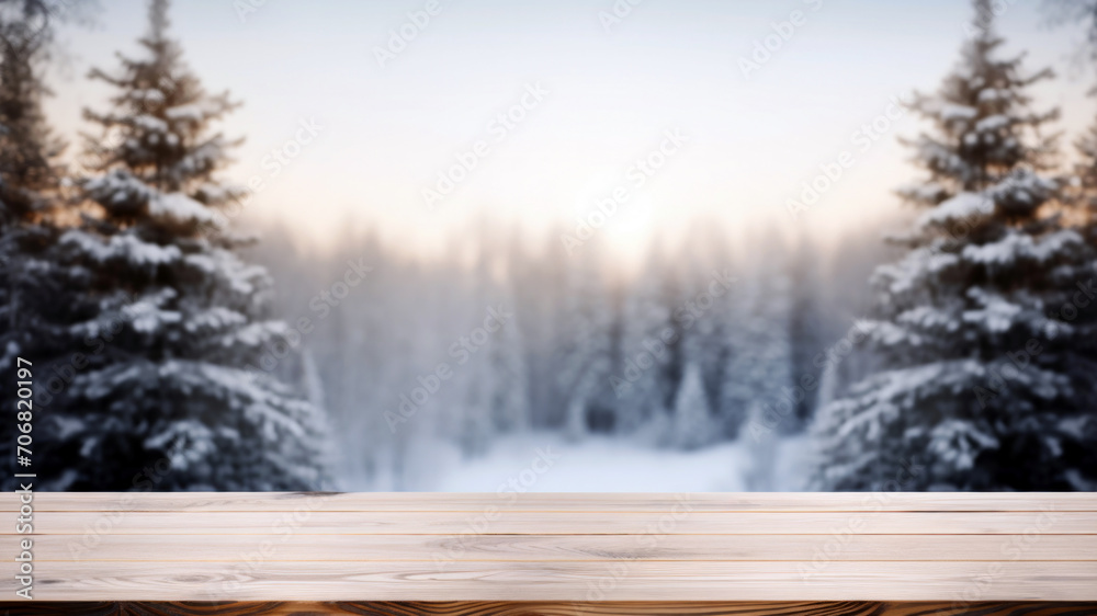 Poster empty wooden table against winter landscape with fir trees and snowflakes blur background