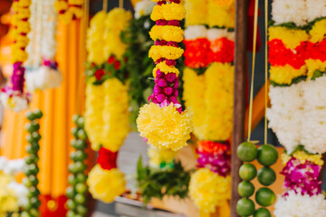 Natural floral neck decorations close-up. Bright Flowers for a Holiday at an Indian Market