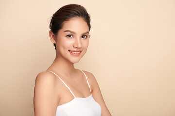 Beautiful young asian woman with clean fresh skin on beige background, Face care, Facial treatment, Cosmetology, beauty and spa, Asian women portrait.