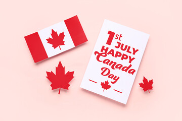 Card with text 1ST JULY HAPPY CANADA DAY, flag and maple leaves on pink background