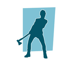 Silhouette of a worker in action pose using his axe tool.