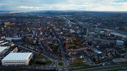 Fototapeta na wymiar Aerial view of the old town of Charleroi on a cloudy day in late autumn. 