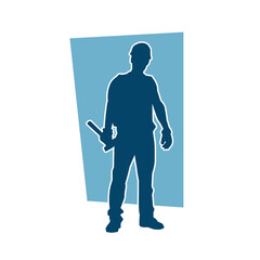 Silhouette of a worker carrying hammer tool. Silhouette of a worker in action pose using hammer tool.