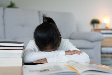 student woman have anxiety because of exams, female prepare for test and learning lessons in the library. stress, despair, haste, misunderstanding reading, discouraged, expectation, knowledge