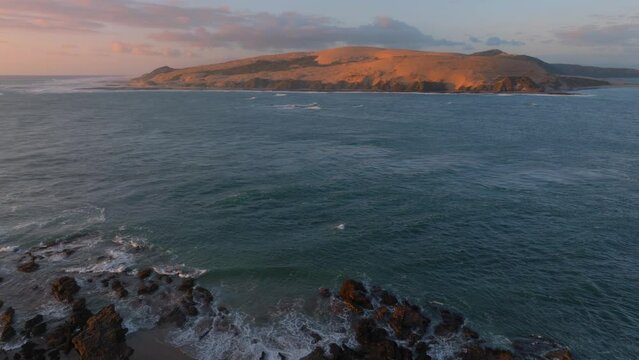 Aerial: The Hokianga Harbour at sunset. Opononi, Northland, New Zealand.