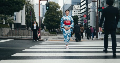 Woman, Japanese traditional dress and walking in city, zebra crossing and travel with journey...