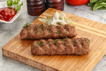 Kebab with beef served onion