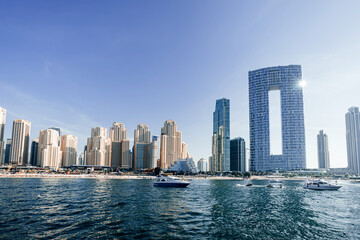 Fototapeta na wymiar Dubai Marina skyscrapers. View from sea. skyscrapers and city beach of dubai united arab emirates