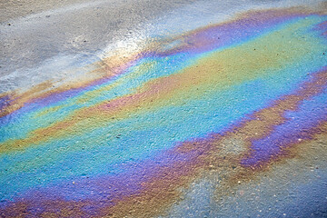 Slick industry oil fuel spilling ground pollution.