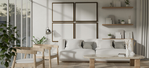 Interior design of a modern white living room with a white cosy couch, a coffee table, and decors.