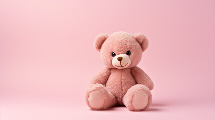 Bear penuche on pale pink background with copy space