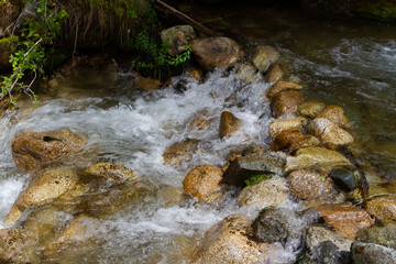 rushing water among stones