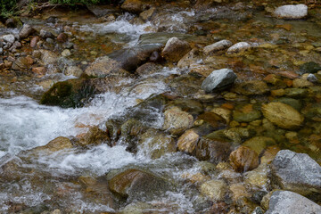 rushing water among stones