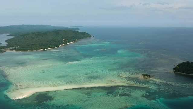 Aerial view of Tropical Islands with beaches and coral reefs. Barobo, Surigao del Sur. Philippines.