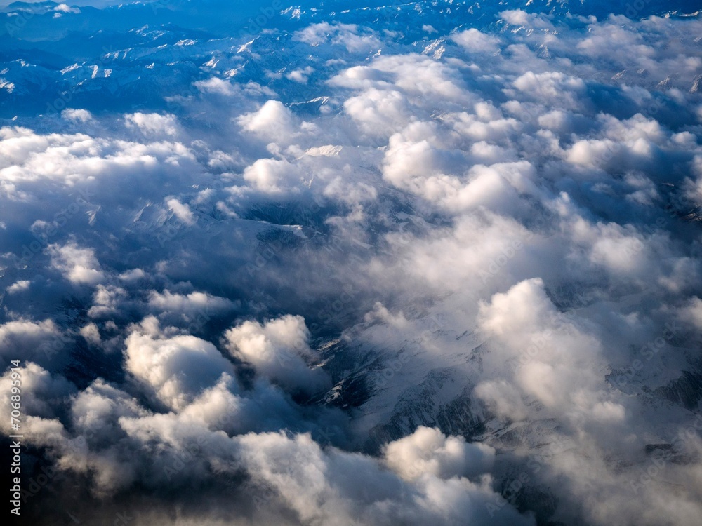 Wall mural cloud airplane aerial sky