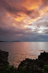 Fototapeta premium Cliff view of a twilight with colorful clouds. Iriomote Island