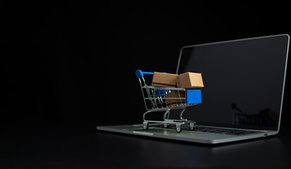 Boxes in a shopping car on a laptop keyboard. Ideas about online shopping, online shopping is a...