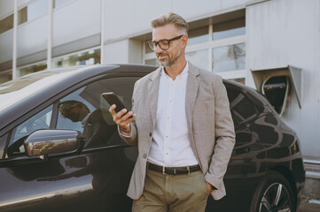Satisfied confident adult man customer male buyer client wearing white shirt classic grey suit...