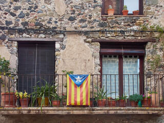 Catalan pro-independence flag tied on a balcony. Girona, Spain - obrazy, fototapety, plakaty