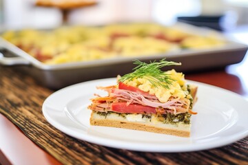 open-faced reuben sandwich with sauerkraut, sliced