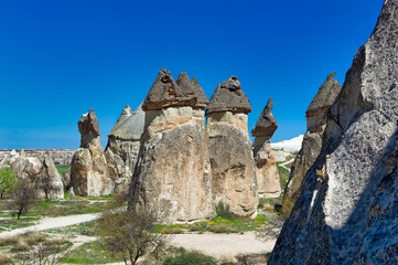 Cappadocia landscape soft volcanic rock, shaped by erosion into towers.