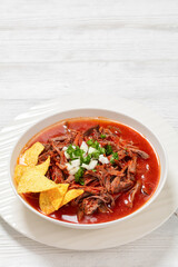 birria de res, mexican beef stew in pepper sauce