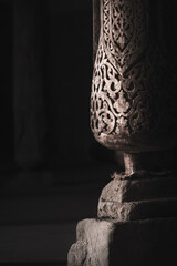 Interior inside the ancient Juma mosque with wooden carved mosaic columns, in the ancient city of Khiva in Khorezm, wood carvings on the columns
